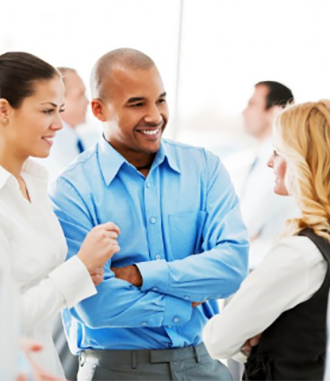 a group of three people talking